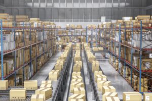 Cardboard boxes moving on conveyor belt in a distribution warehouse