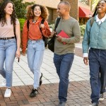 Diverse group of students arrive at University Campus
