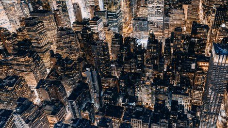Cover image with Manhattan at night, used for October 2026 U.S. Office Market Outlook.