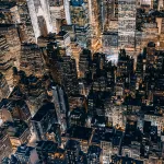 Cover image with Manhattan at night, used for October 2026 U.S. Office Market Outlook.
