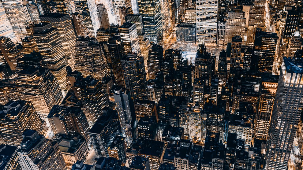 Cover image with Manhattan at night, used for October 2026 U.S. Office Market Outlook.